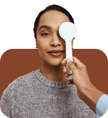 woman taking an eye test