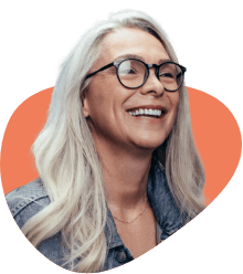 woman with glasses smiling